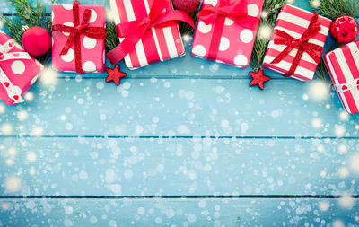 Close-up of christmas gifts on table