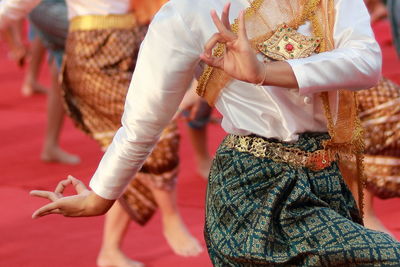 Midsection of woman dancing during celebration