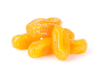 Close-up of orange fruit against white background