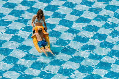 High angle view of woman in swimming pool