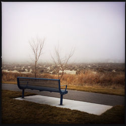 Empty bench in park