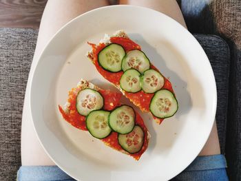 High angle view of fruits in plate on table