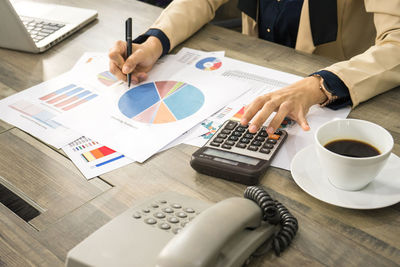High angle view of man using laptop on table