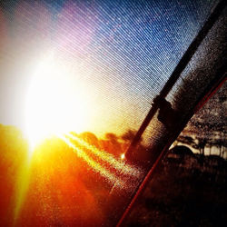 Sun shining through clouds