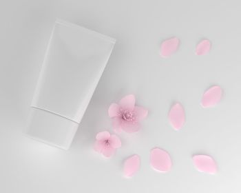 High angle view of pink paper on white table