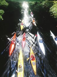 High angle view of people on boat in river