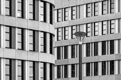 Low angle view of buildings and streetlight in city