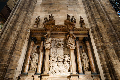 Low angle view of statue of historic building