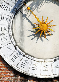 High angle view of cropped sundial