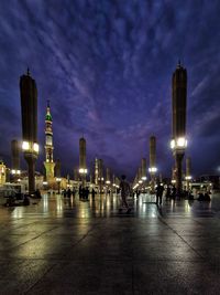 Illuminated city buildings at night