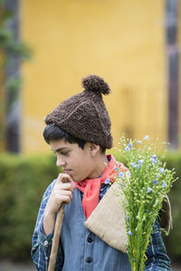 Full length of young man looking at camera