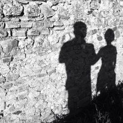 Shadow of man on wall