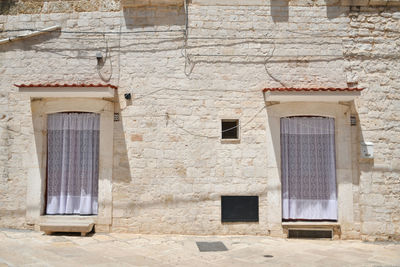 The exterior of a house in a small street in casamassima, a villagein the puglia region, italy.