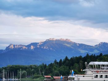 Scenic view of mountain against cloudy sky