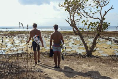 Surfers at the beach