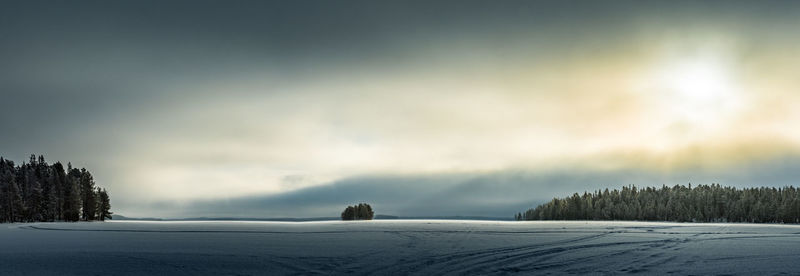 Scenic view of snow field against sky