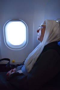 Nun traveling by plane