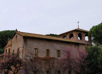 Low angle view of old building against clear sky