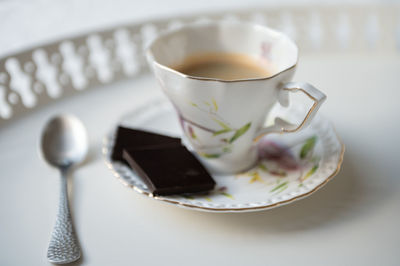 Close-up of tea cup on table