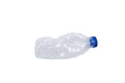 Close-up of bottle against white background