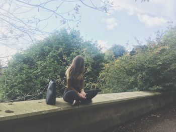 Two people sitting in park