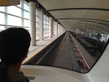 Rear view of train moving in subway station