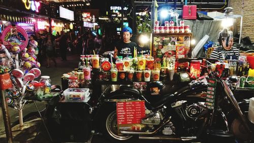Group of people at market stall