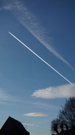 Low angle view of vapor trail in sky