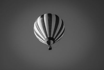 Low angle view of hot air balloon against clear sky