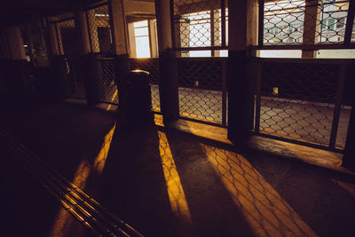 Sunlight falling on building seen through window