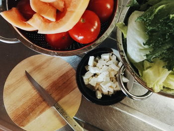 High angle view of chopped vegetables in bowl on table