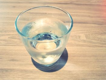 High angle view of water in glass on table