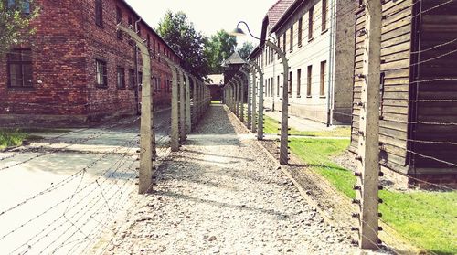 Narrow alley in front of building