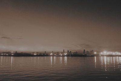 Scenic view of sea against sky at night