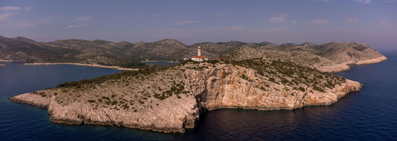 Drone panorama of struga lighthouse on the croatian island of lastovo