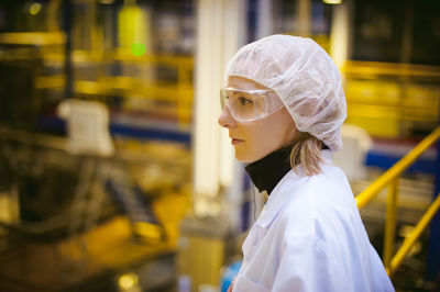 Scientist working in factory