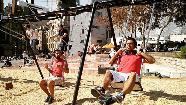 lifestyles, leisure activity, casual clothing, person, childhood, full length, young adult, happiness, sunlight, beach, day, playground, fun, sand, boys, sitting, enjoyment, outdoors