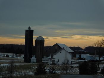 Built structure against sky during sunset