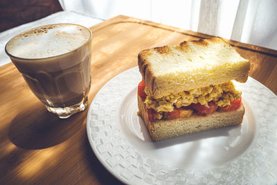 Close-up of breakfast served on table