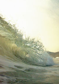 Close-up of sea waves against the sky