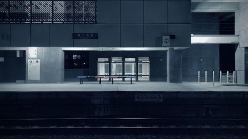 Railroad station platform seen through window