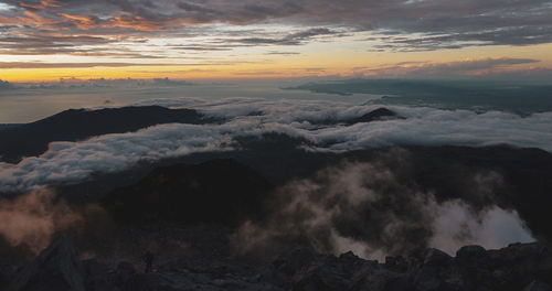 Scenic view of mountains against sky during sunset