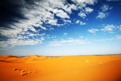 Scenic view of desert against sky