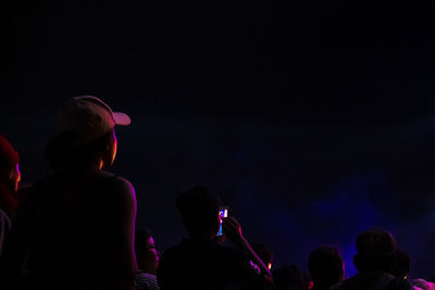 People enjoying at music concert