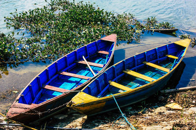 High angle view of boat moored on beach