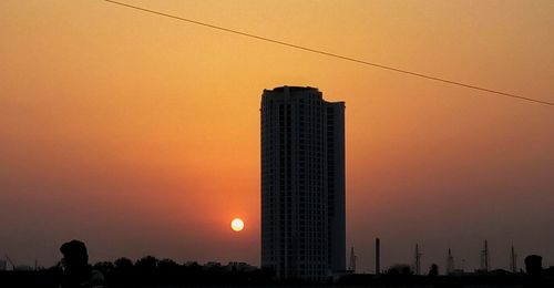 Silhouette of skyscrapers at sunset