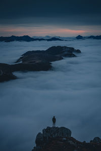 Scenic view of mountain against sky at sunset