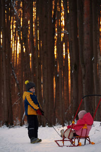 People in forest during winter