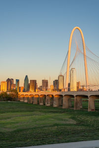 Bridge over river against clear sky