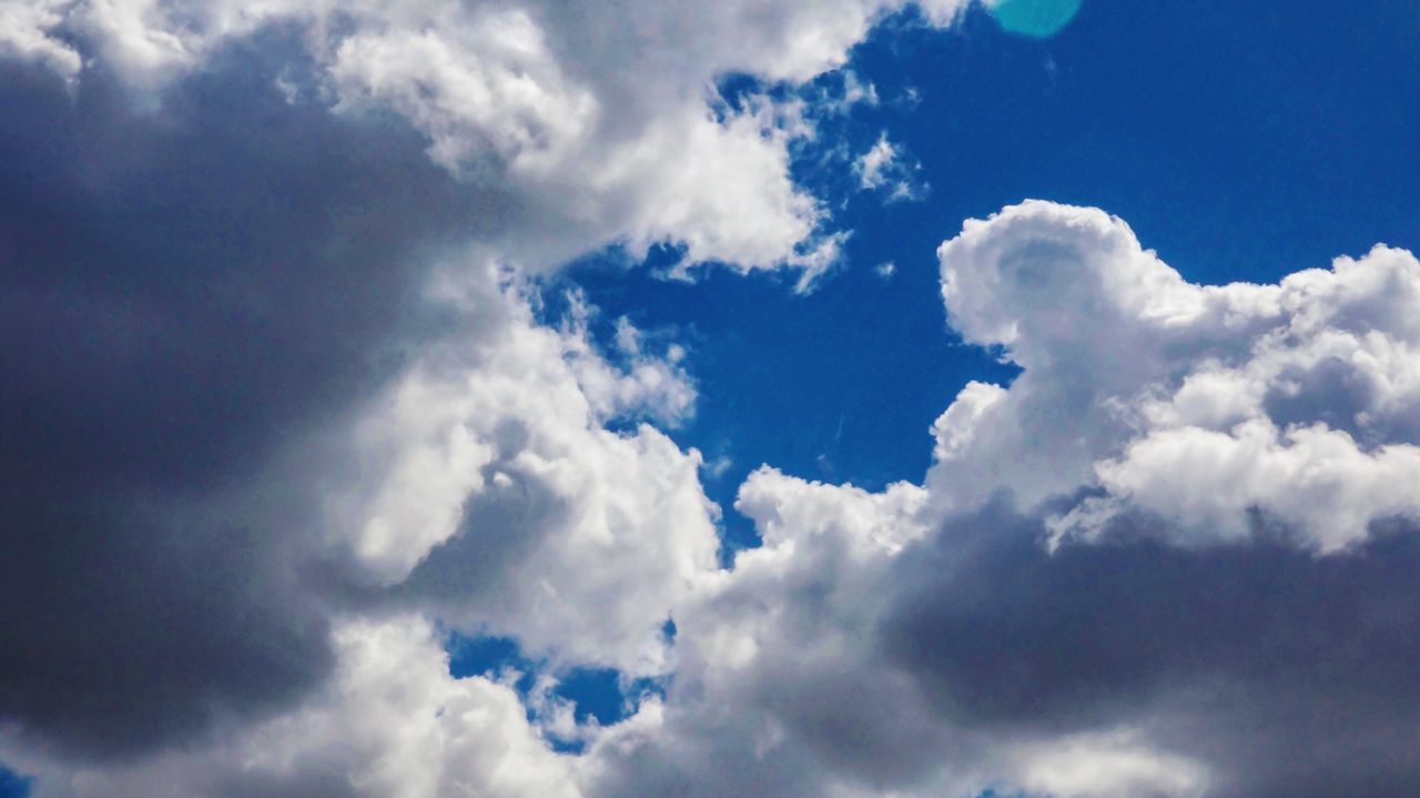 cloud - sky, low angle view, sky, nature, white color, beauty in nature, tranquility, cloudscape, no people, day, outdoors, scenics, backgrounds